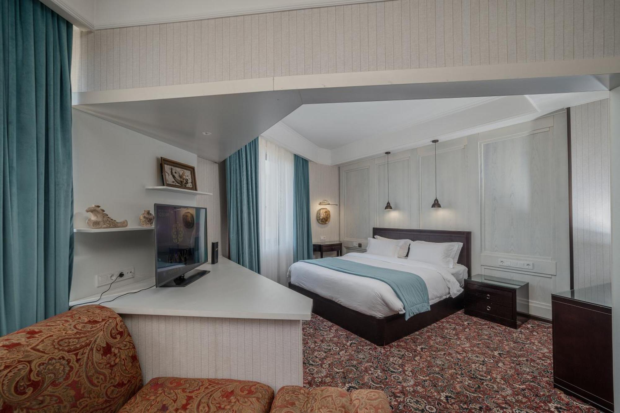 Hotel Jannat Regency Biškek Pokoj fotografie